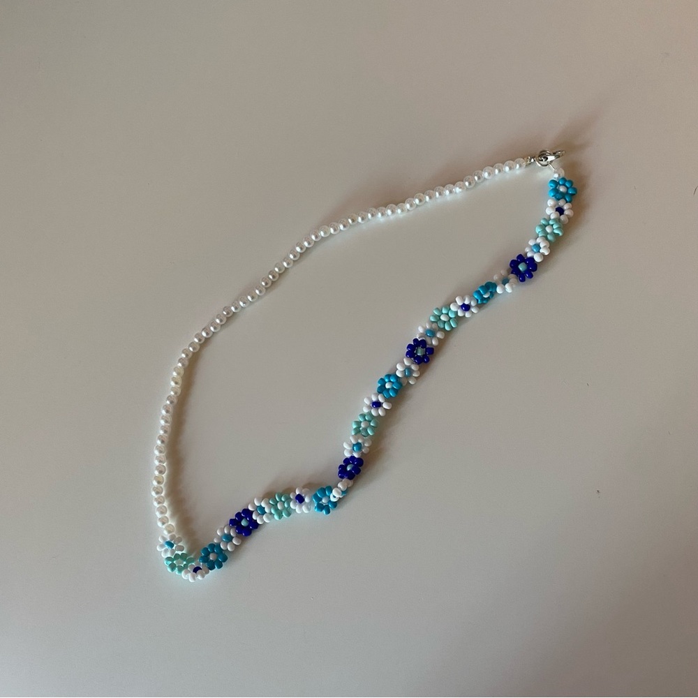 Mama Mia inspired necklace. 
Half floral and half Pearl beaded necklace